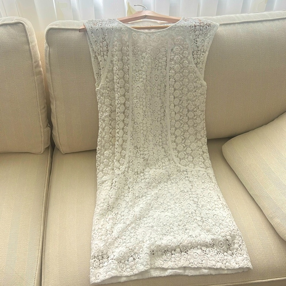 Cotton dress with floral embroidery. Very pretty & feminine.